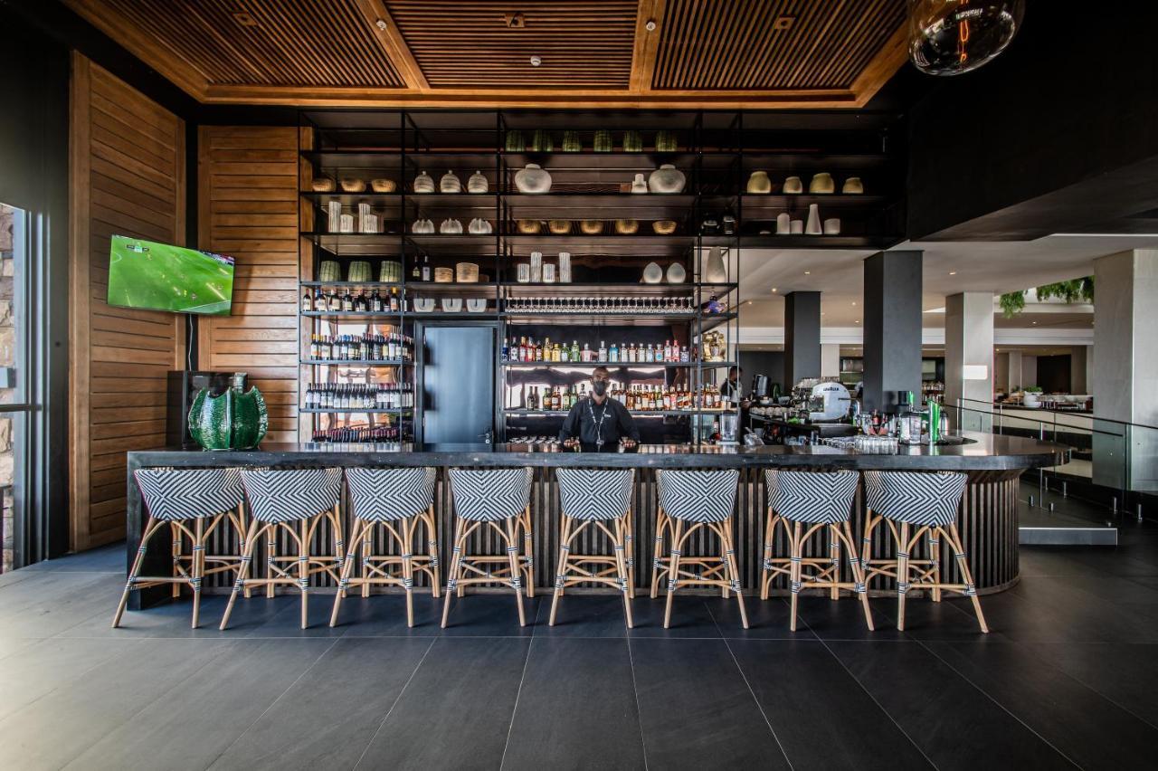 The Capital Zimbali Hotell Ballito Eksteriør bilde The bar at the restaurant
