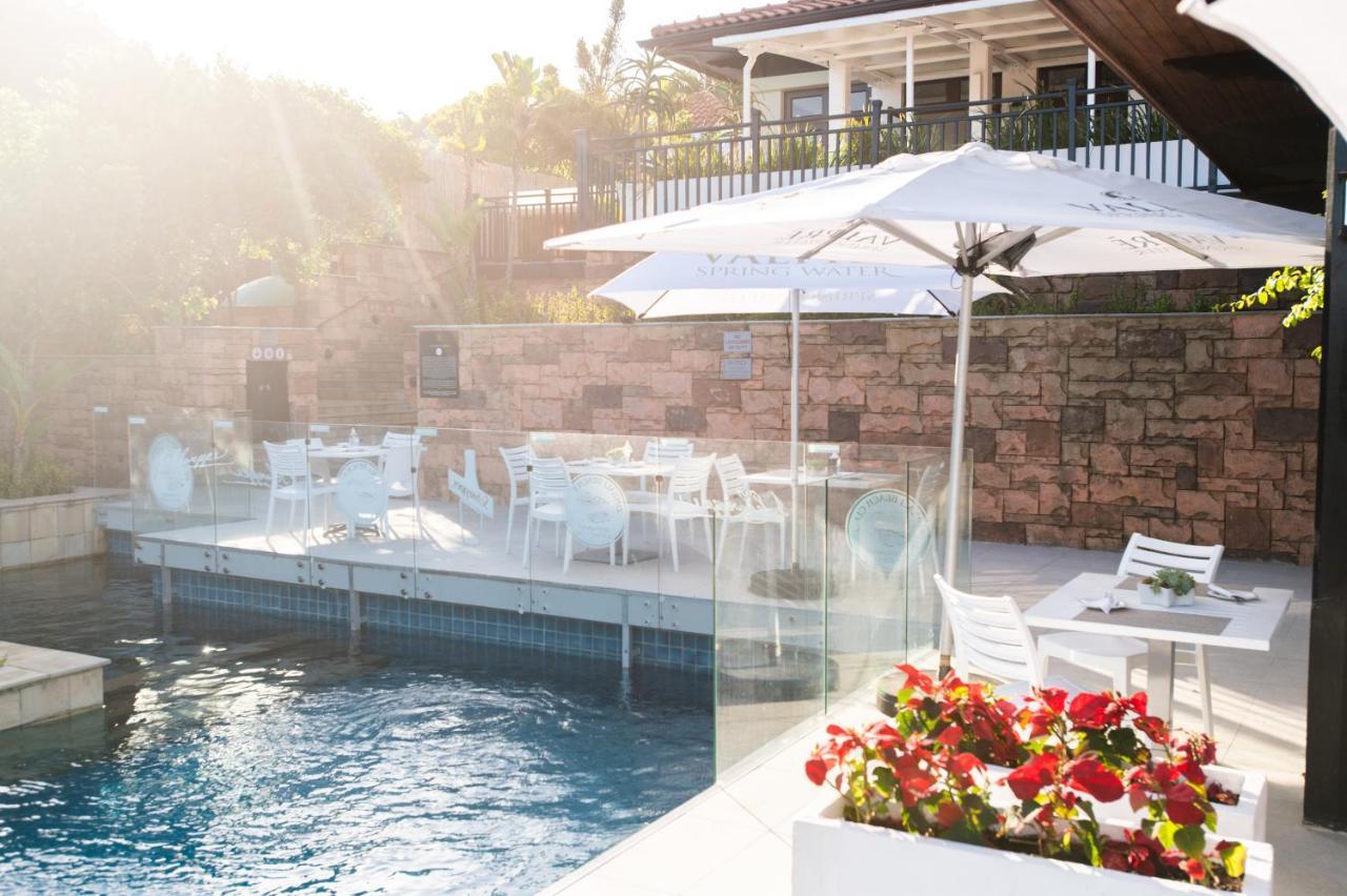 The Capital Zimbali Hotell Ballito Eksteriør bilde The pool at the hotel