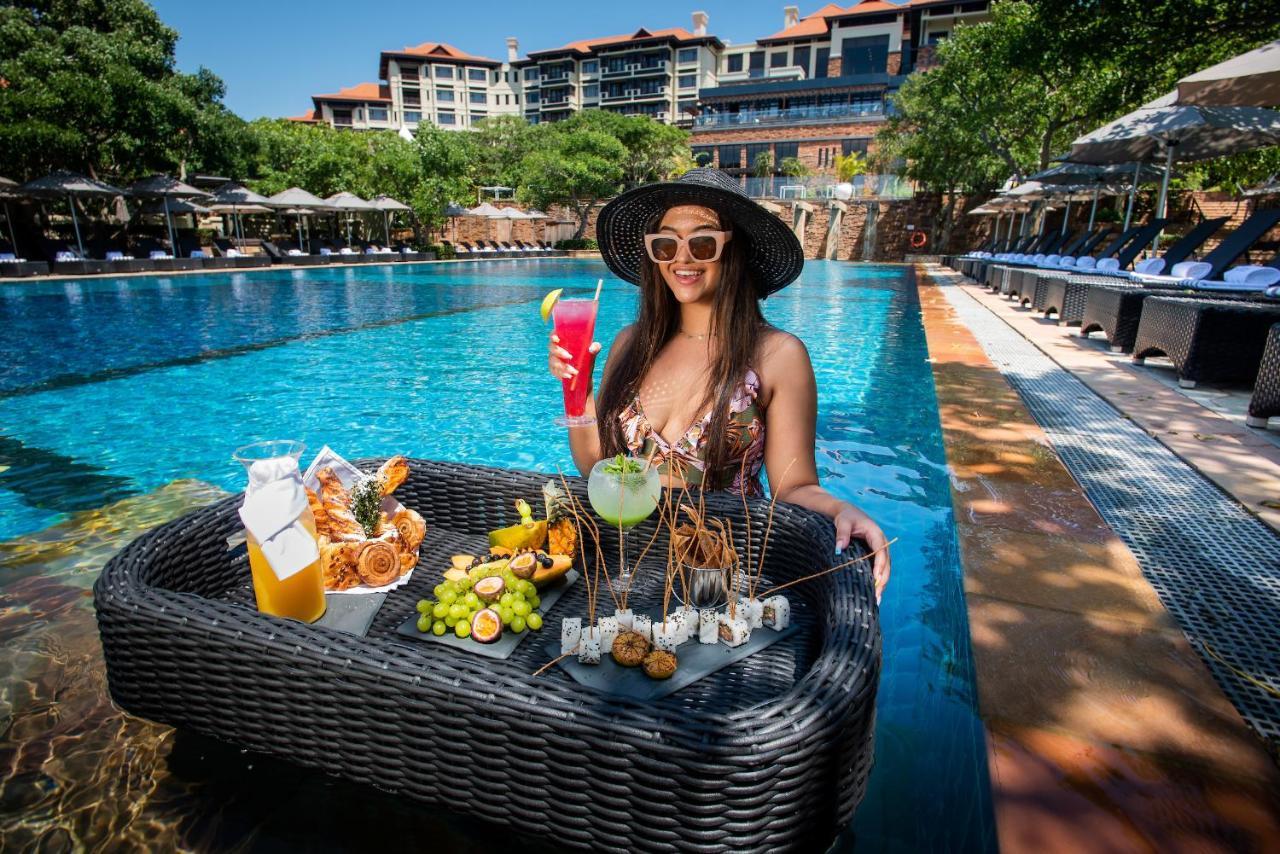 The Capital Zimbali Hotell Ballito Eksteriør bilde Poolside at the hotel